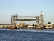 Blagoveschensky Bridge across the Big Neva River under reconstruction. A temporary bridge 